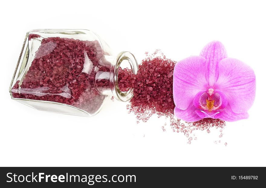 bath salt and orchid isolated on white