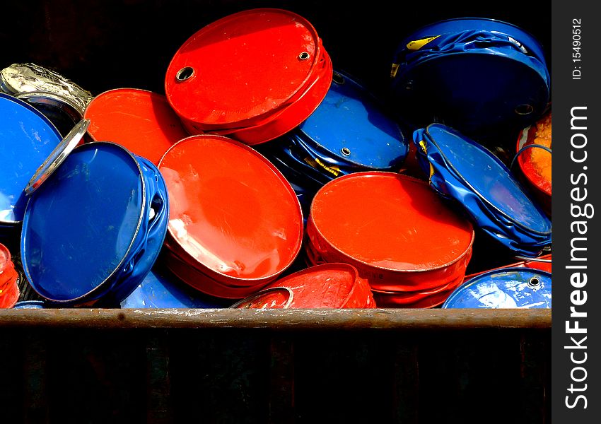 Red and blue barrels loaded in a container. Red and blue barrels loaded in a container