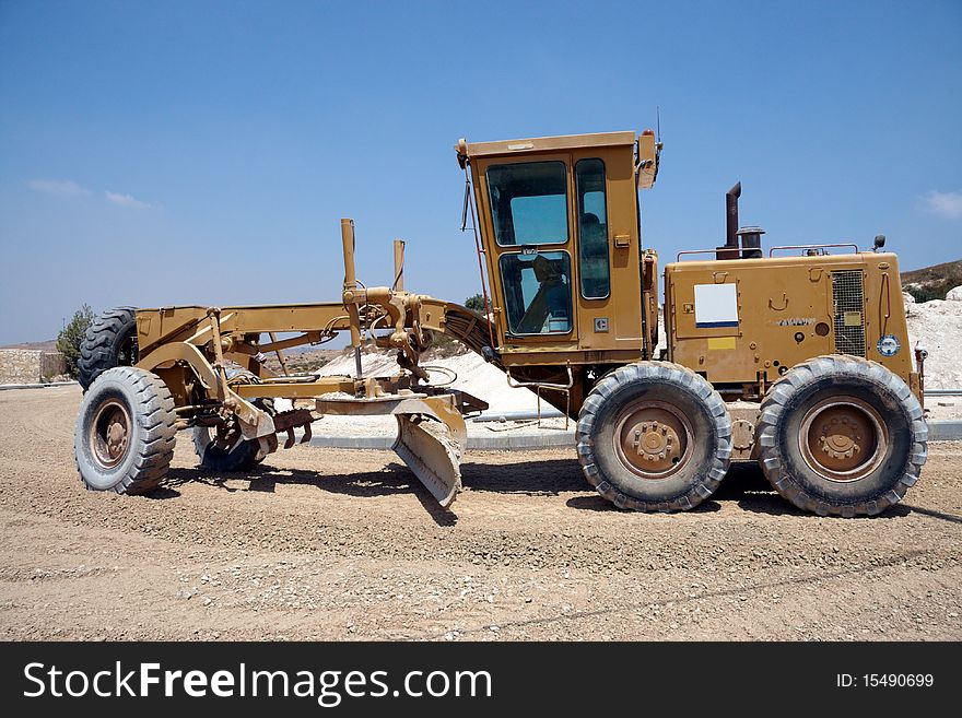 Large tractor working on a new road