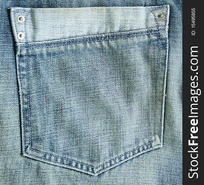 Closeup of blue jeans pocket
