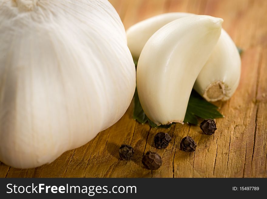 Vintage still life with garlic, pepper, close-up