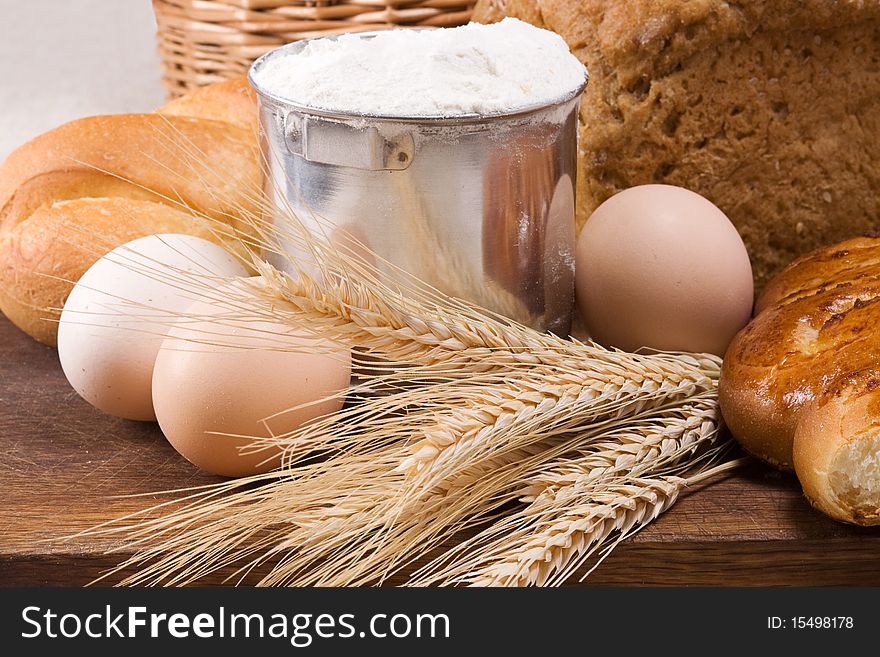 Set of bakery products on wood board