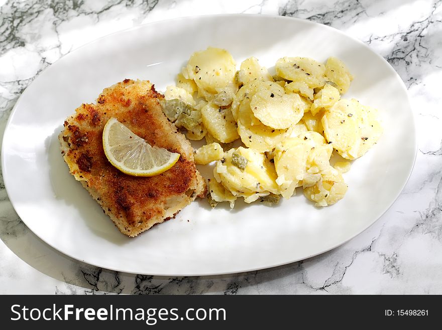 Fried Fish And Potato Salad