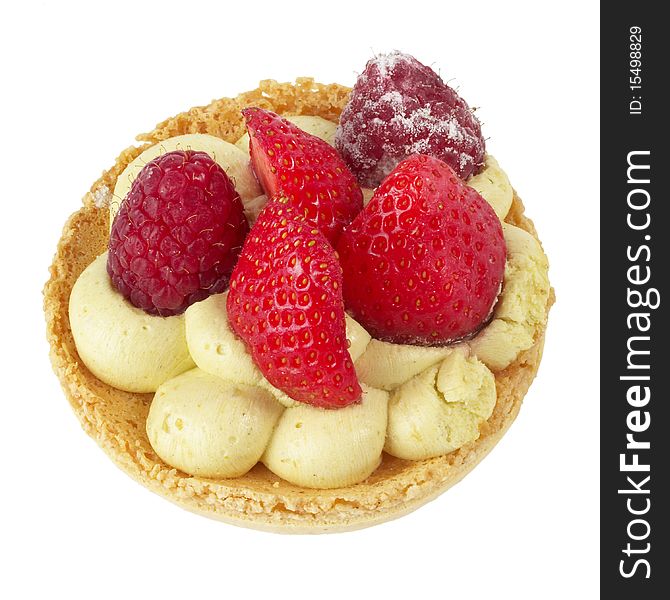 Small berries tart macro shot isolated over white background