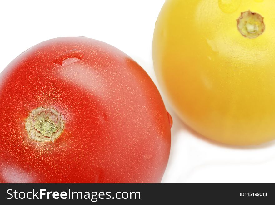 Red And Yellow Cocktail Tomatoes Isolated On White