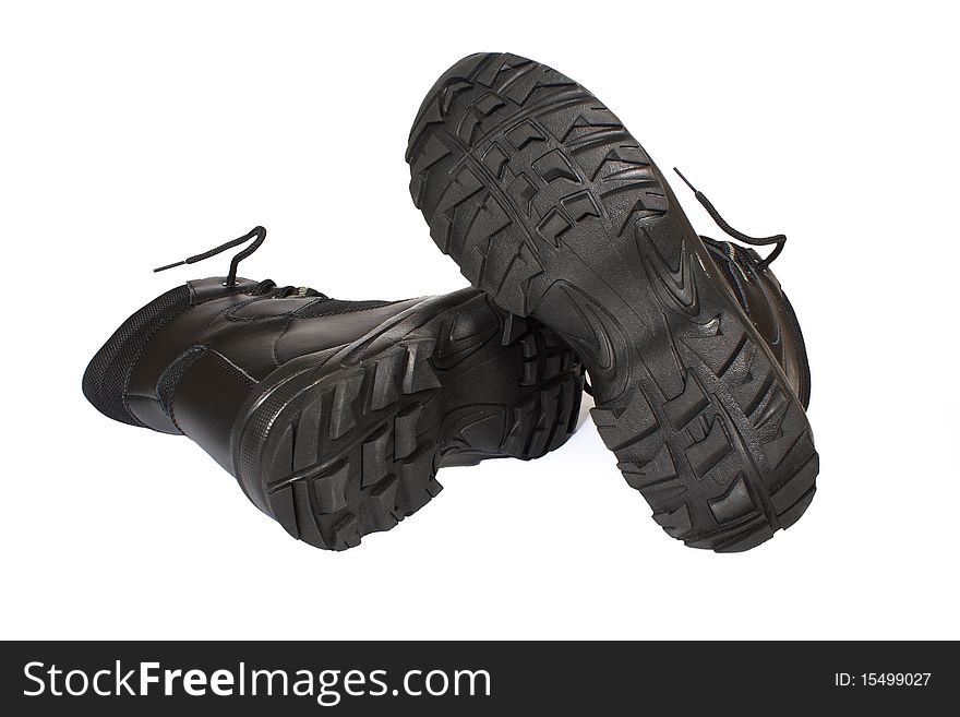 Black hiking boots on a white background