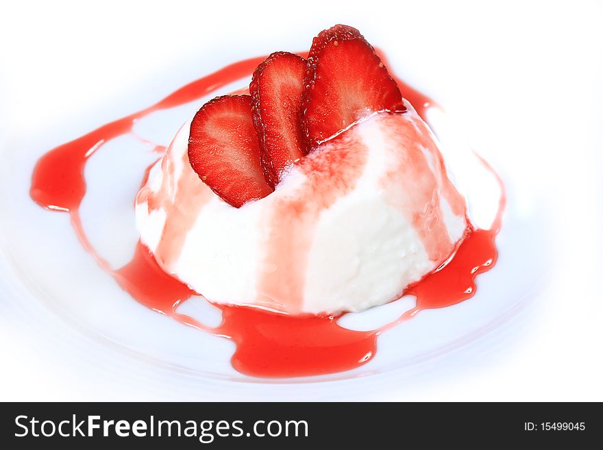 Ice cream with strawberries and syrup