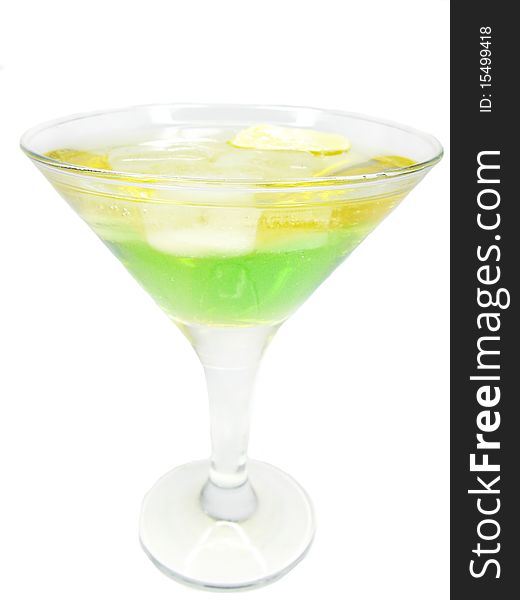 Alcohol green and yellow liqueur cocktail with ice and cherry. Alcohol green and yellow liqueur cocktail with ice and cherry