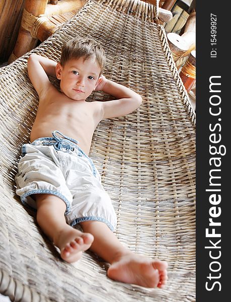 Boy relaxing in hammock