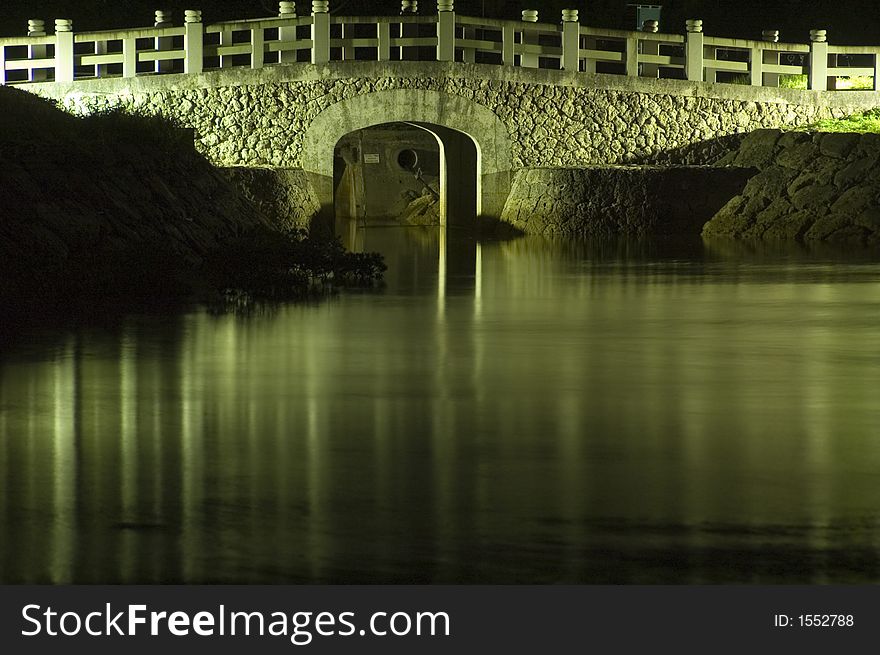 Bridge at night over water. Bridge at night over water