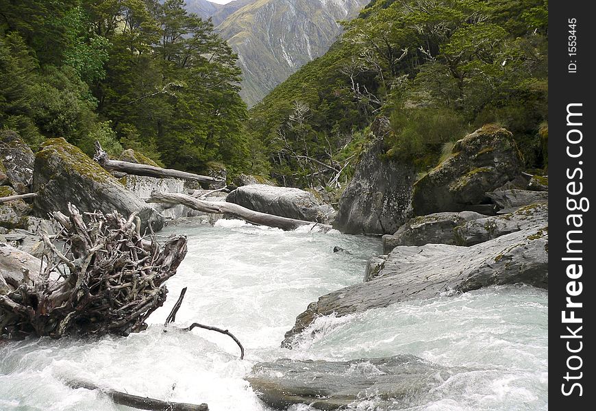 A river torrent coming from a glacier in New Zealand. A river torrent coming from a glacier in New Zealand