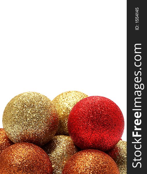Multicolored shiny christmas balls stacked on a white background. Multicolored shiny christmas balls stacked on a white background