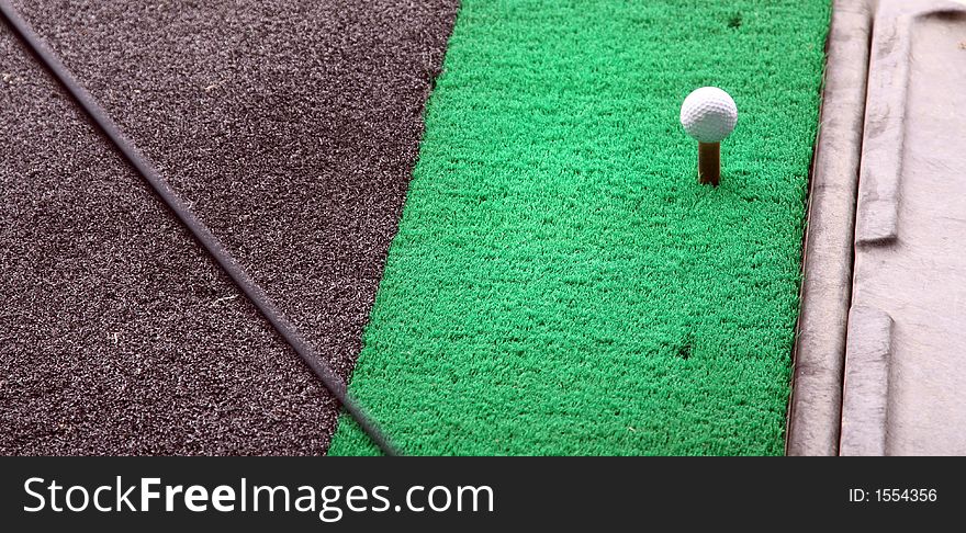 Golf training mat at driving range