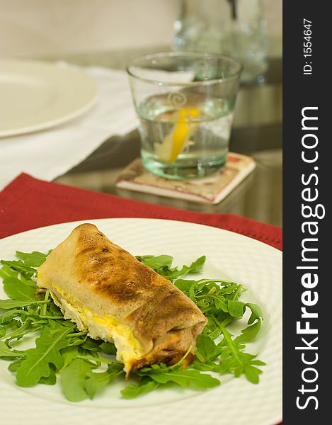 Meat cannelloni on bed of rocket. Meat cannelloni on bed of rocket