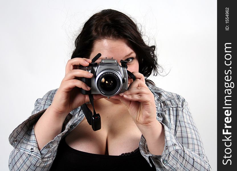 A girl with a digital camera. A girl with a digital camera.