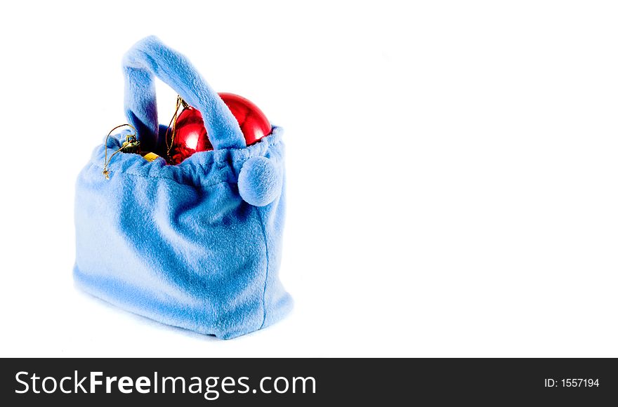 Blue toy bag full of Christmas-tree decorations. Blue toy bag full of Christmas-tree decorations
