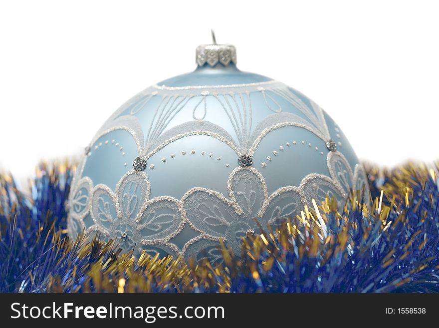 Blue christmas ball with gold and blue decor. Soft focused isolated objects. Blue christmas ball with gold and blue decor. Soft focused isolated objects.