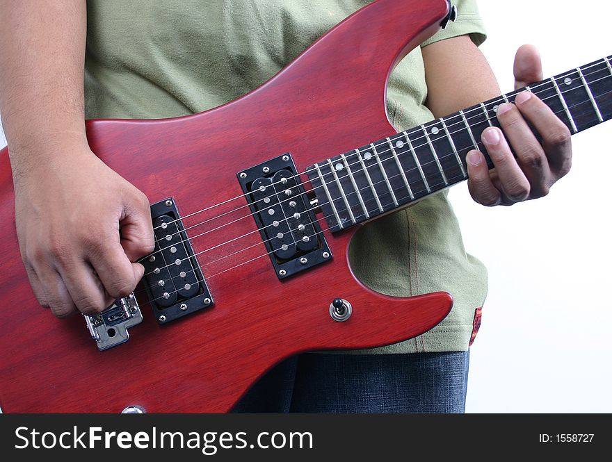 Close up a man playing guitar. Close up a man playing guitar.