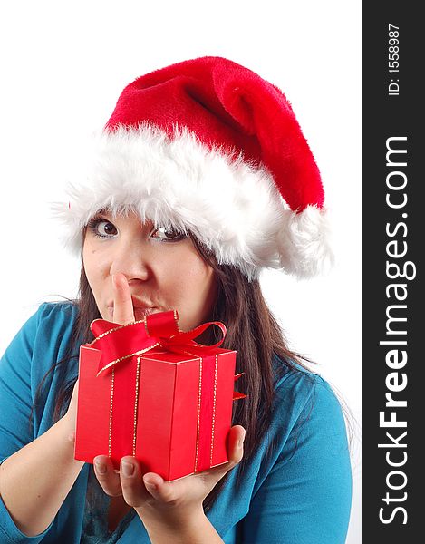 Attractive woman with santa claus hat and gift on white background. Attractive woman with santa claus hat and gift on white background