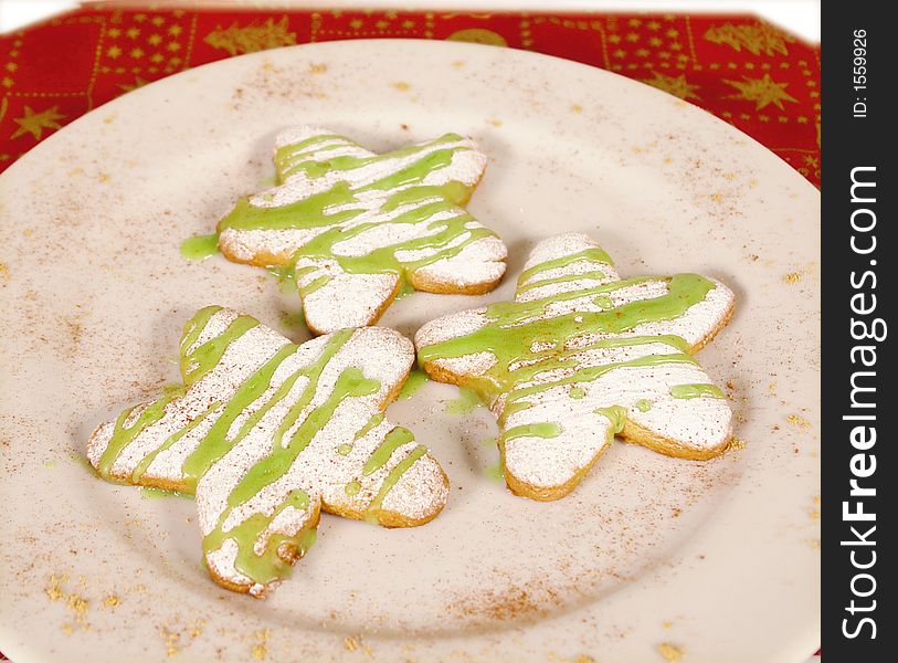 Homemade giant christmas cookies in star form on a plate. Homemade giant christmas cookies in star form on a plate