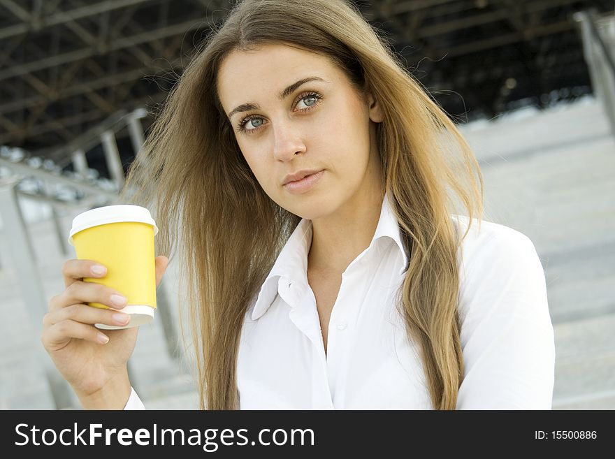 Young successful businesswoman having a coffebreak. Young successful businesswoman having a coffebreak