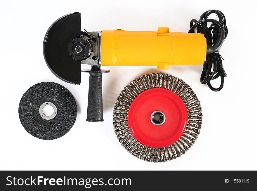 Industrial grinder with sand and wire brush discs. Industrial grinder with sand and wire brush discs.