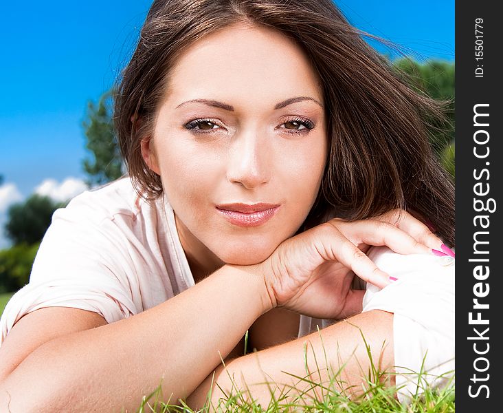 Beautiful glamorous woman with white dress, outdoor shot