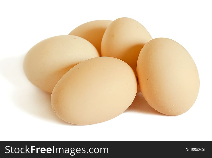 Five eggs isolated on white.