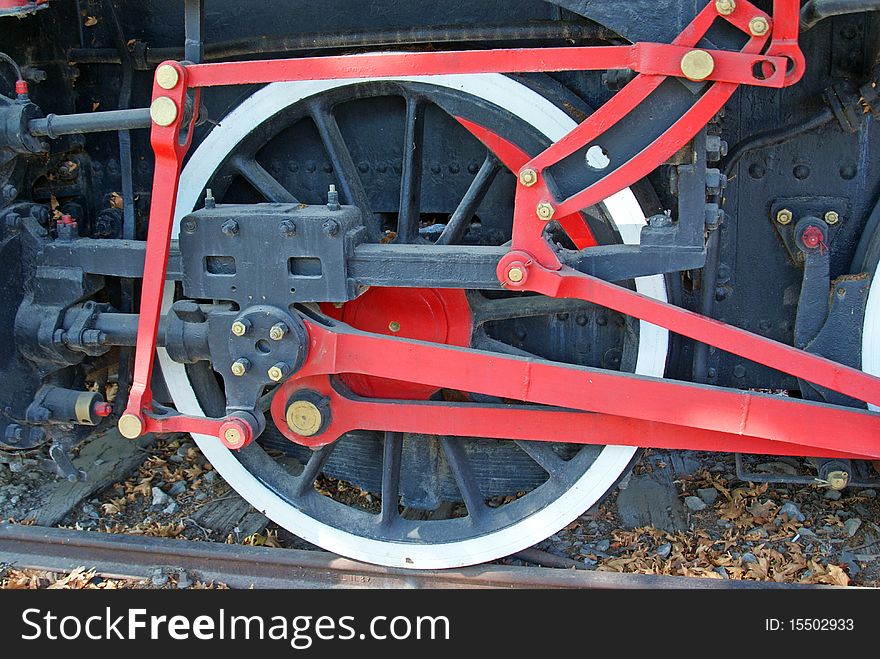 Ingenious mechanism at old locomotive wheels transmission. Ingenious mechanism at old locomotive wheels transmission