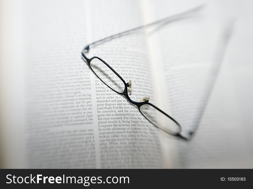 Eyeglasses Open On Book, Lensbaby