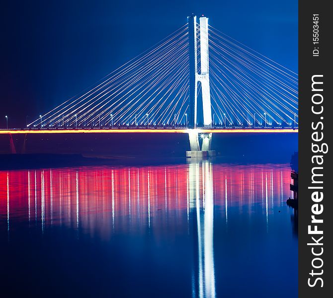 The night view of the bridge nanchang jiangxi china. The night view of the bridge nanchang jiangxi china.