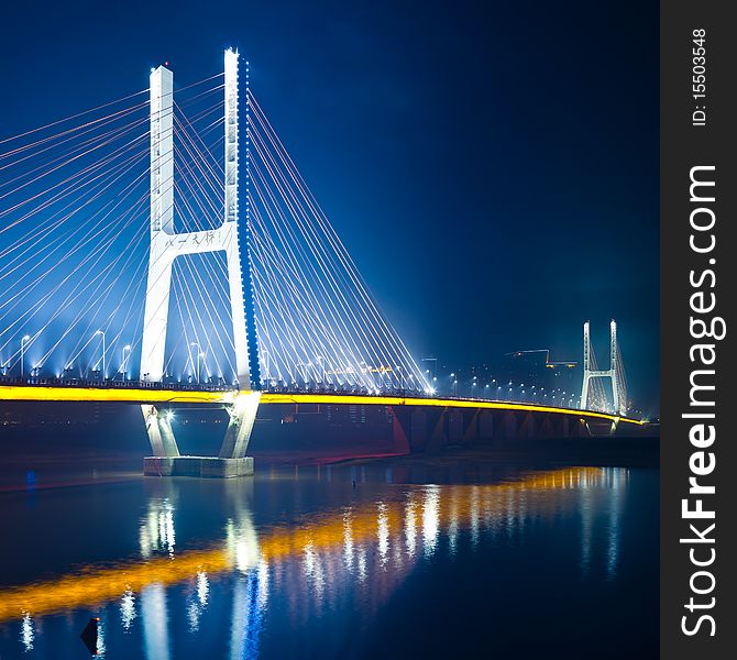 The night view of the bridge nanchang jiangxi china. The night view of the bridge nanchang jiangxi china.