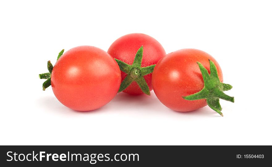 Small Tomatoes On A White Background