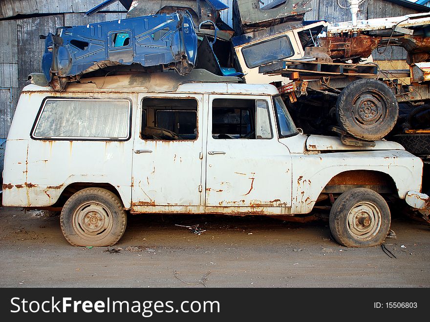 A view of an old abandoned and junked car. 1970's international scout jeep. A view of an old abandoned and junked car. 1970's international scout jeep.