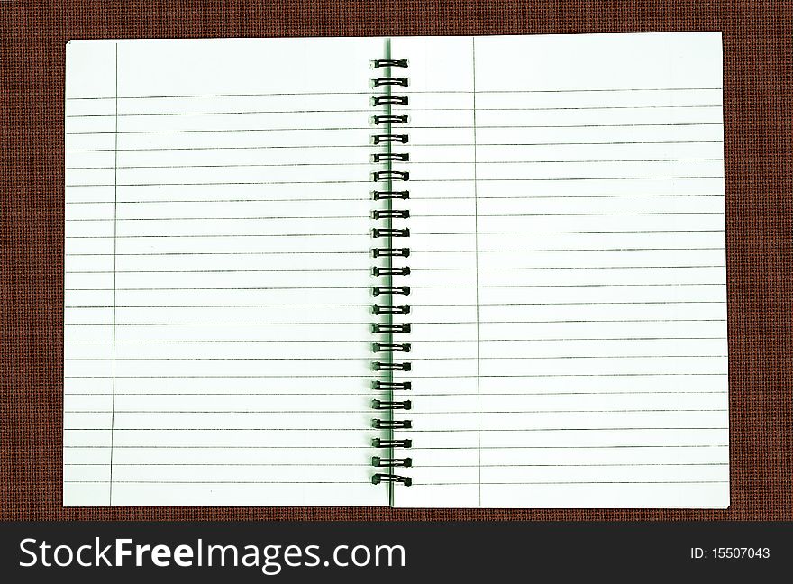 Blank notebook on textured background. Blank notebook on textured background.