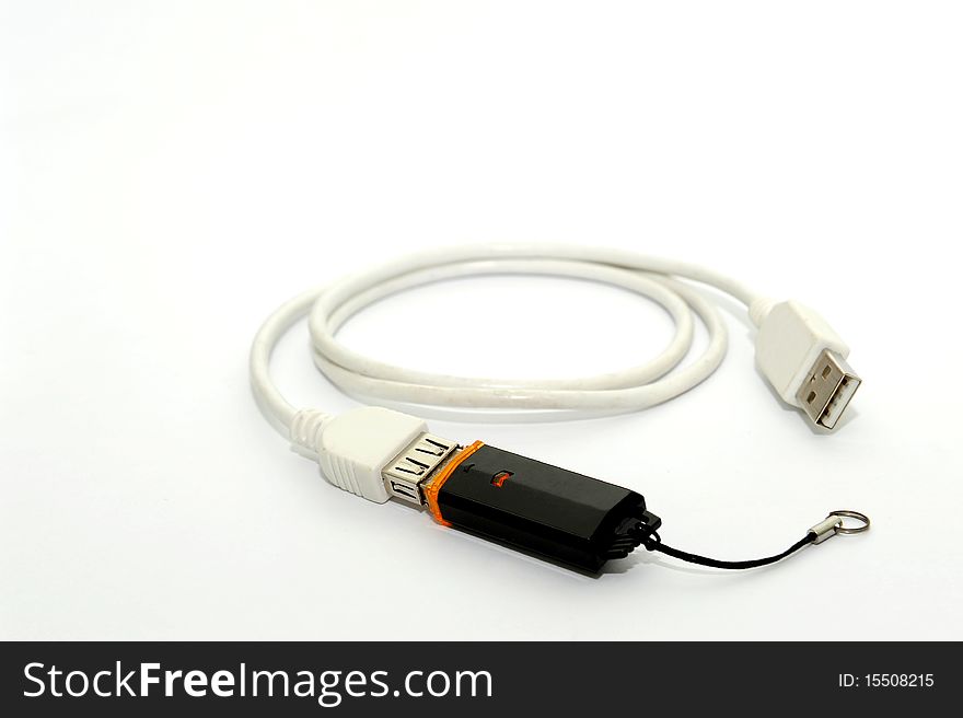 USB drive attach to white cable. USB drive attach to white cable