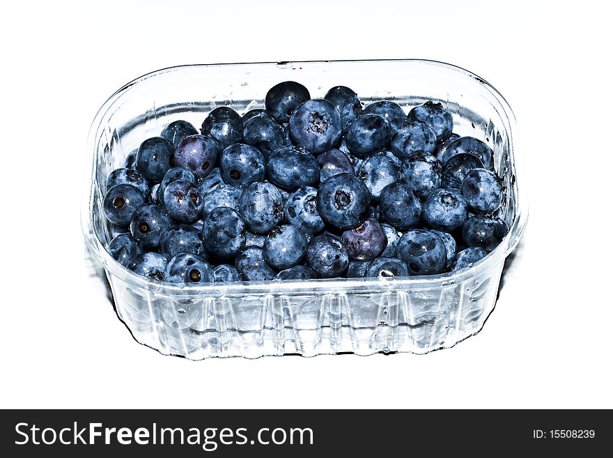 Transparent box of blueberries isolated on white background. Transparent box of blueberries isolated on white background