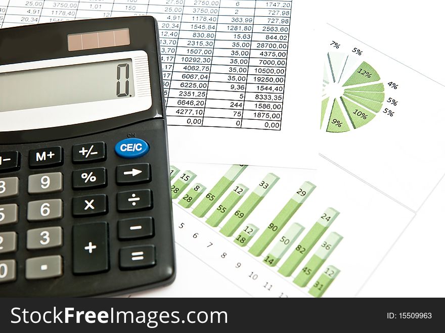 Close-up on stock market data chart and calculator. Close-up on stock market data chart and calculator.