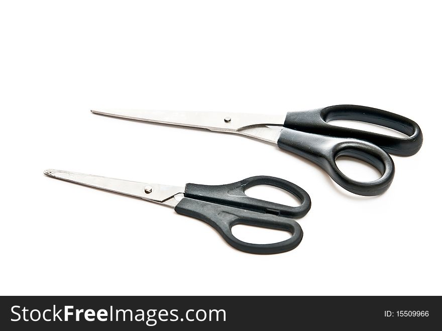 Two stainless scissors isolated on white background