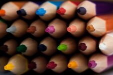 Wooden Pencils In All Colors Seen From The Sheet Of Pencils. Colored Pencils Stacked With A Black Background. Colors. Back To Stock Photos