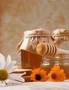 Flowers And Honey On Sackcloth Royalty Free Stock Images Flowers And Honey On Sackcloth Royalty Free Stock Images