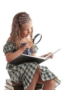 Little Girl Holding Magnifying Glass Stock Photo