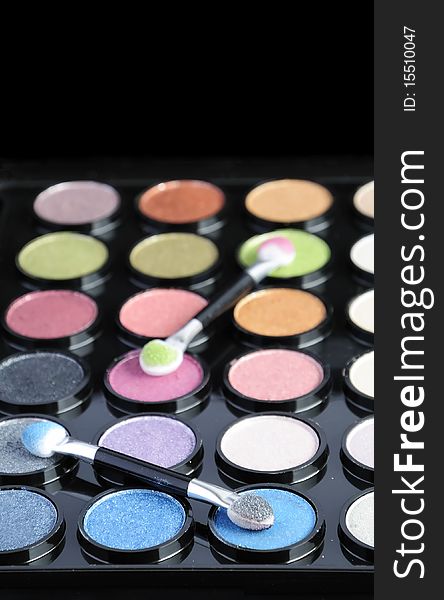 Makeup palette closeup isolated on black background