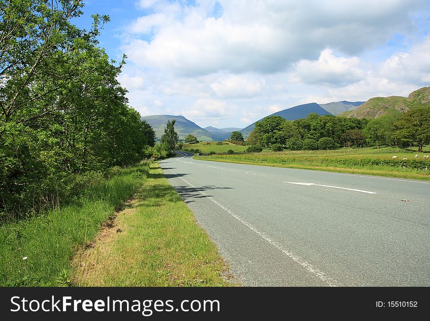Travelling, a road  in Lake District. Travelling, a road  in Lake District