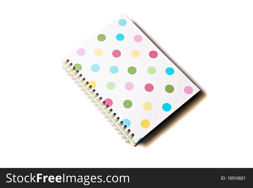 The blank white notebook isolated on the white background