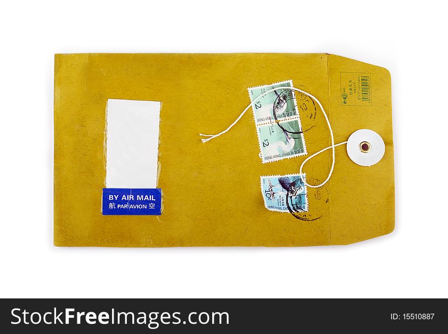 Used paper envelope with postage stamps and free space for text on white background. Used paper envelope with postage stamps and free space for text on white background