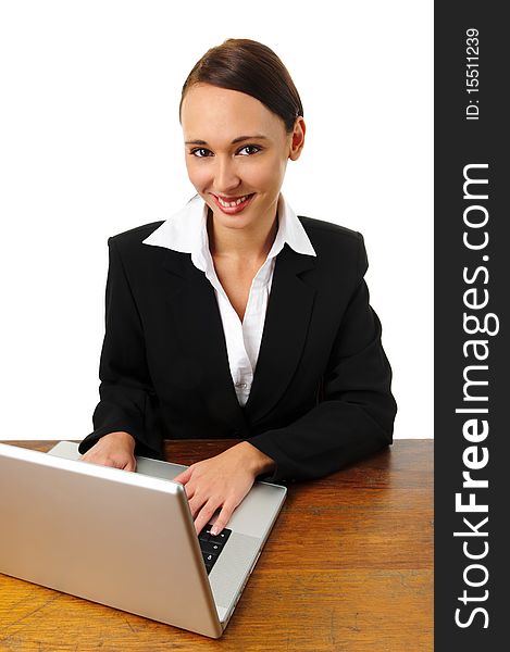 Young successful career woman works from her laptop. Young successful career woman works from her laptop