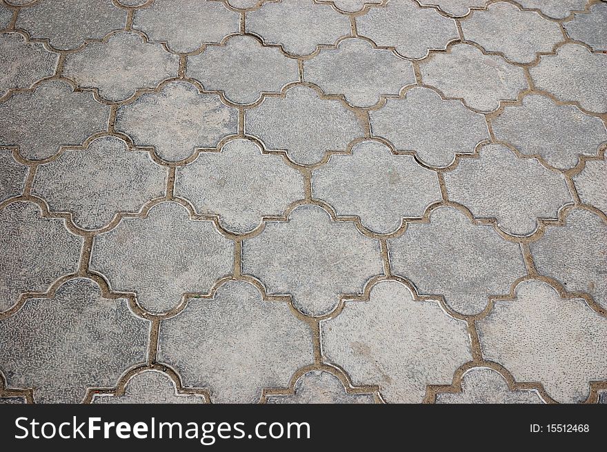 Close up of grey pavement tiles
