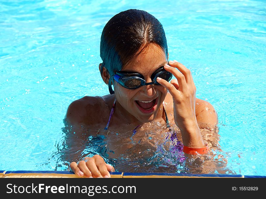 Teen Girl In Swimming Pool Portrait