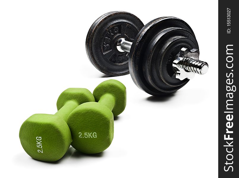 Black and green dumbbells on a white background with space for text